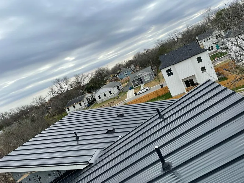 Standing seam metal roof panels with vents for Skylight Repair in Springville